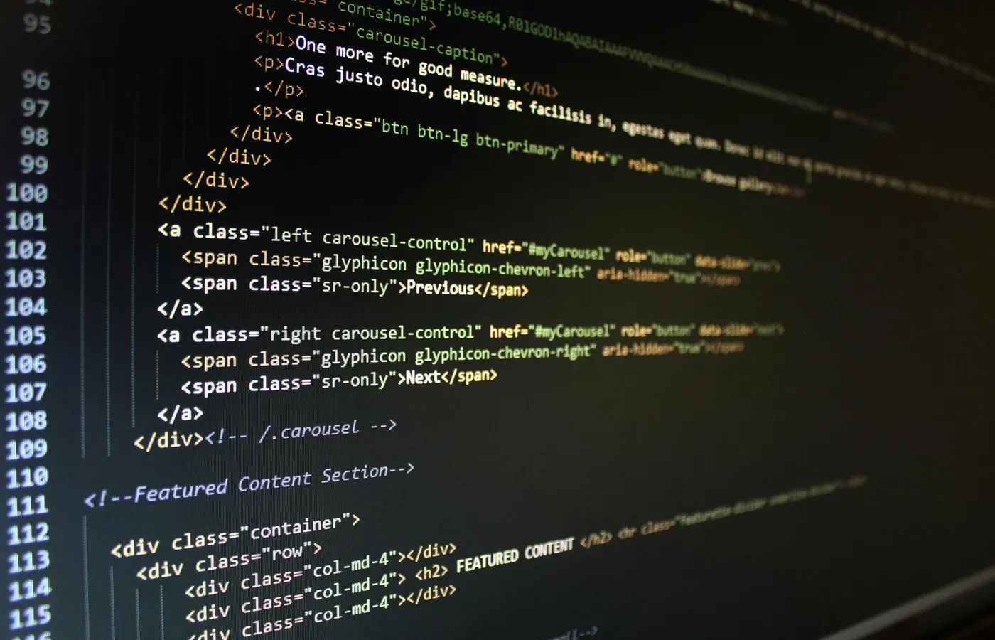 Software code displayed on a laptop